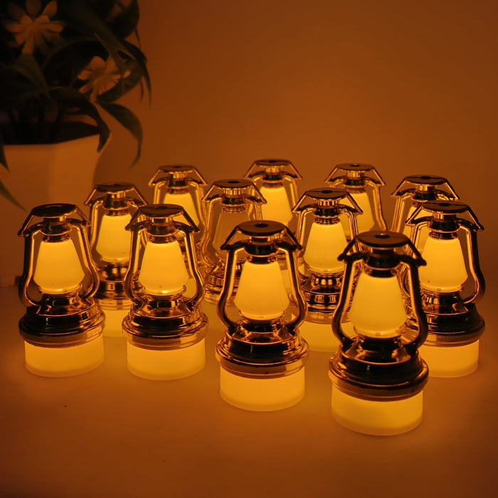 Set of 12 vintage lantern flameless LED candles emitting warm yellow light